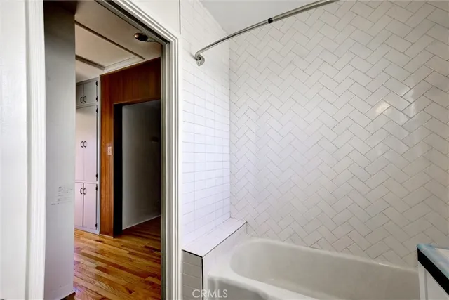 a view of a backyard with potted plants