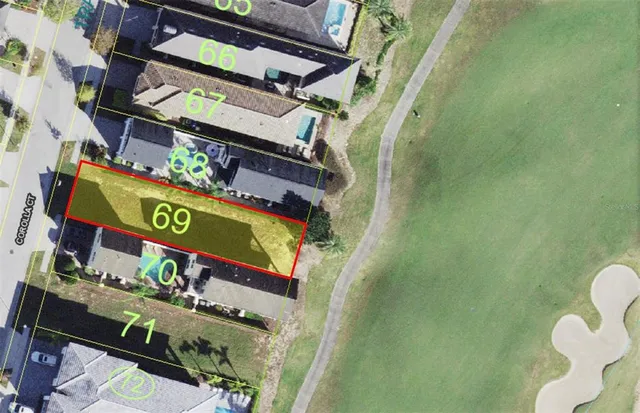 a front view of a house with a garden and yard