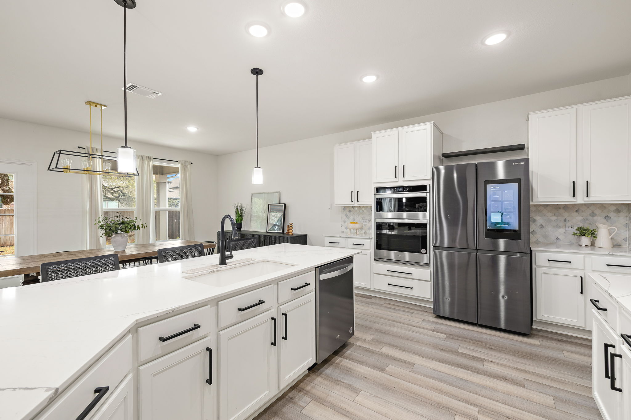 717 Priscilla Court Leander, TX 78641 - Photo 12 of 37 Upgraded smart refrigerator conveys!