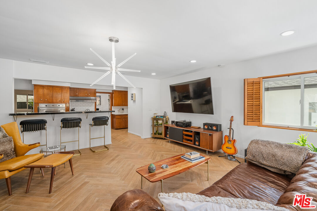 1534 Belleau Road Glendale, CA 91206 - Photo 13 of 40 a living room with furniture kitchen view and a large window