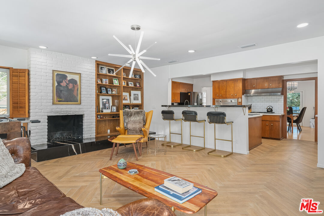 1534 Belleau Road Glendale, CA 91206 - Photo 14 of 40 a living room with furniture and fireplace