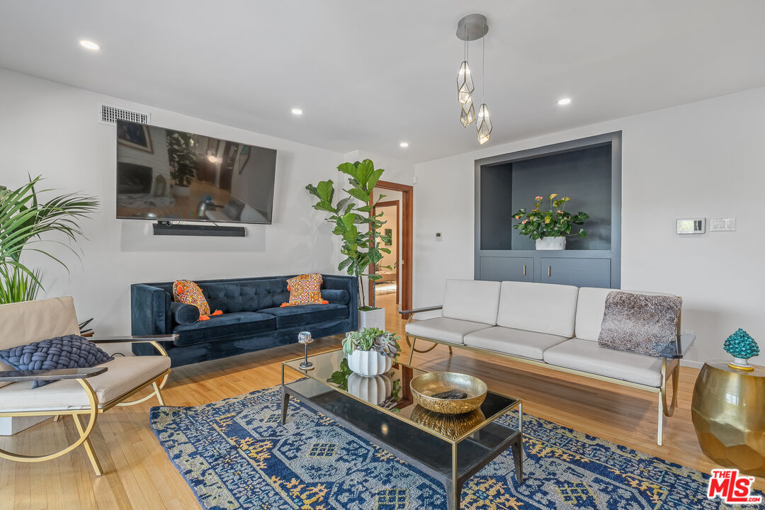 1534 Belleau Road Glendale, CA 91206 - Photo 22 of 40 a living room with furniture and a rug