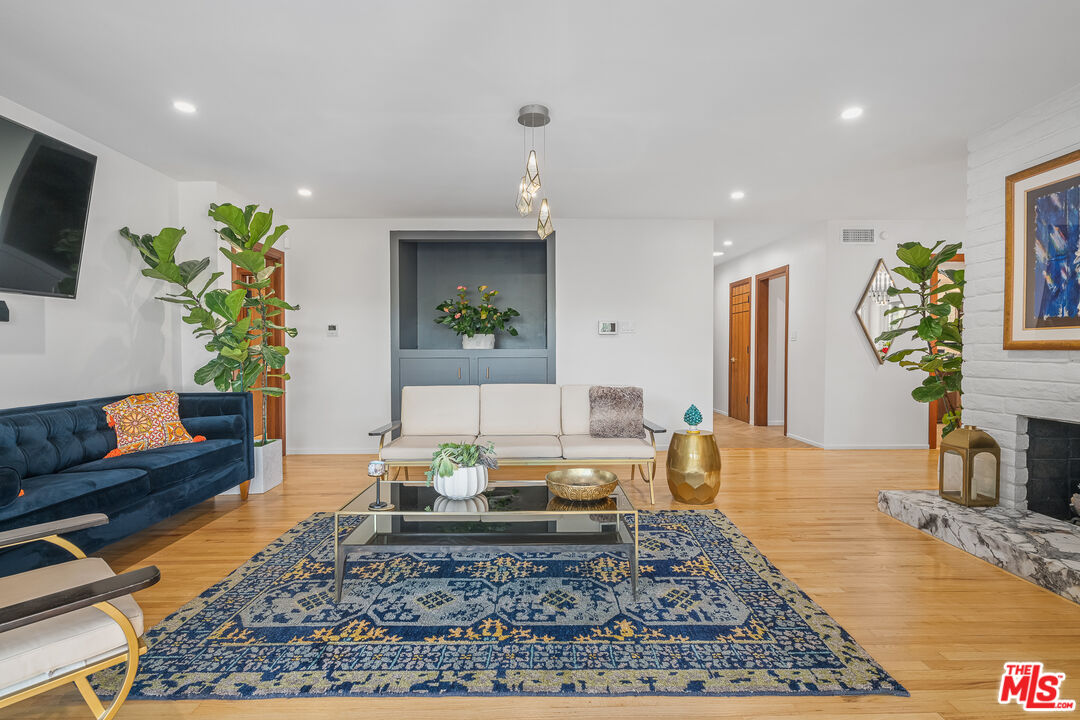 1534 Belleau Road Glendale, CA 91206 - Photo 23 of 40 a living room with furniture and a rug