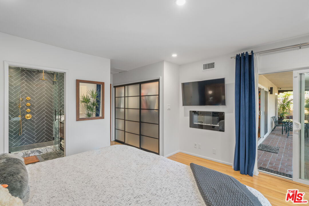 1534 Belleau Road Glendale, CA 91206 - Photo 26 of 40 a bedroom with a bed and a dresser