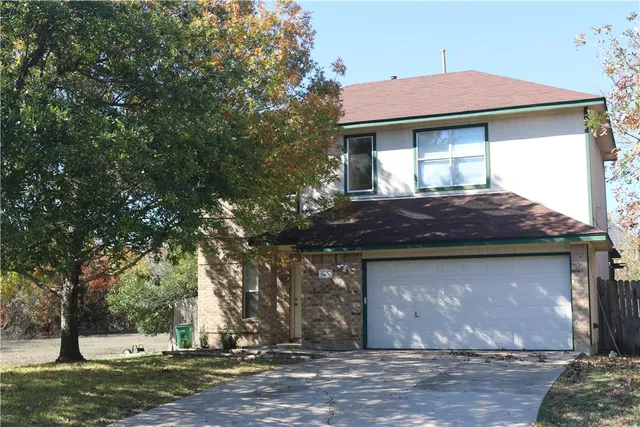 a front view of house with yard