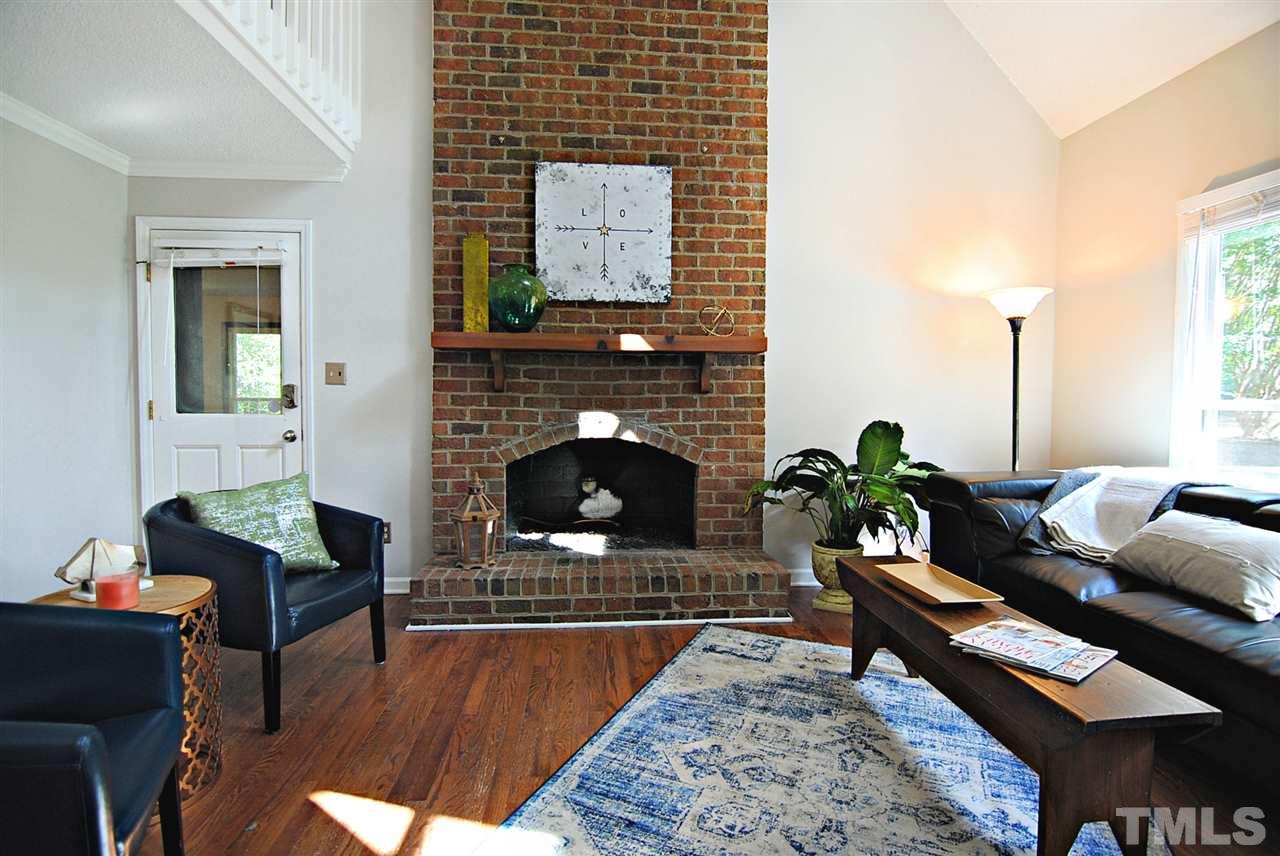 1716 Park Ridge Way Raleigh, NC 27614 - Photo 3 of 24 a living room with furniture and a fireplace