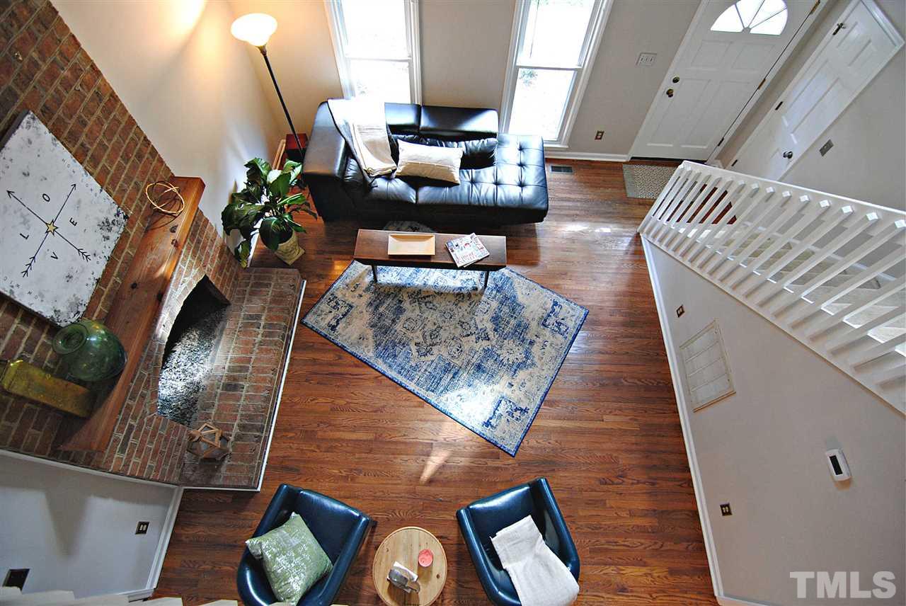 1716 Park Ridge Way Raleigh, NC 27614 - Photo 4 of 24 a living room with furniture and a fireplace