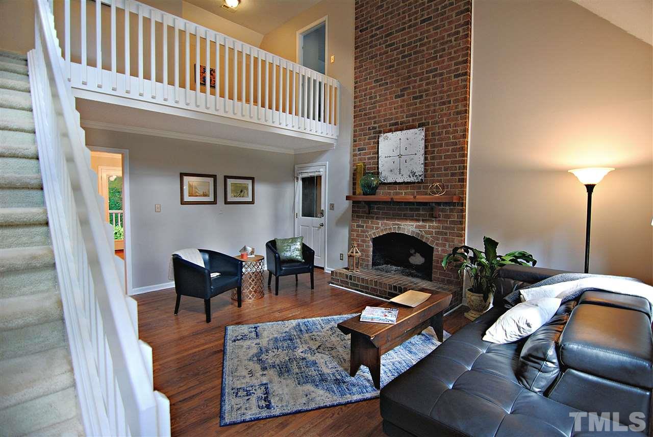 1716 Park Ridge Way Raleigh, NC 27614 - Photo 5 of 24 a living room with furniture and a fireplace