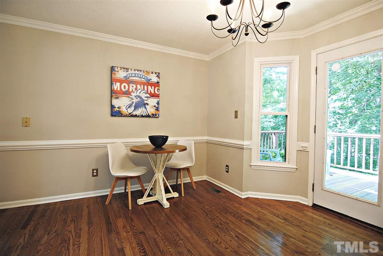 1716 Park Ridge Way Raleigh, NC 27614 - Photo 10 of 24 a workspace with wooden floor