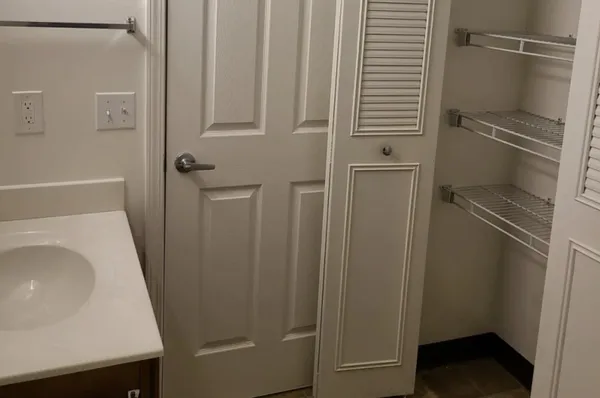 a bathroom with a sink and a toilet