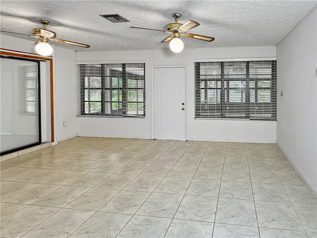 6602 Eden Road Fort Pierce, FL 34951 - Photo 11 of 24 a view of an empty room with a window