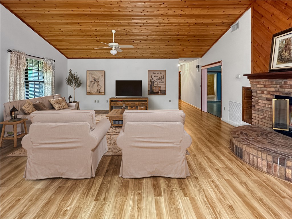 6602 Eden Road Fort Pierce, FL 34951 - Photo 8 of 24 a living room with furniture and a flat screen tv