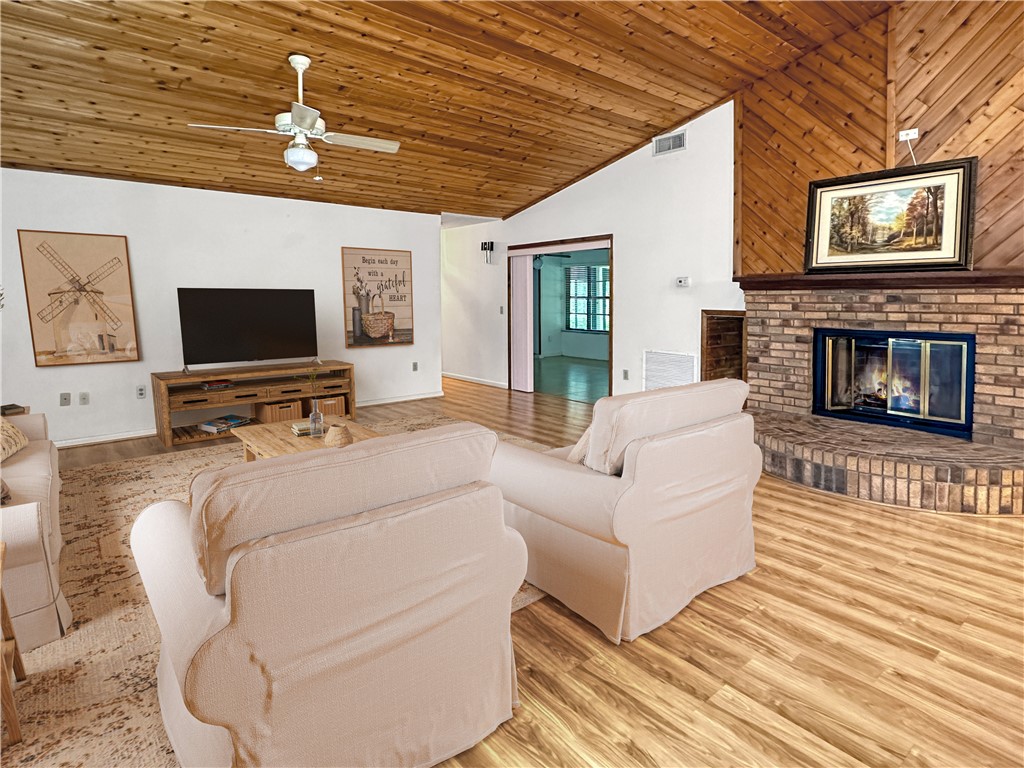 6602 Eden Road Fort Pierce, FL 34951 - Photo 9 of 24 a living room with furniture and a flat screen tv