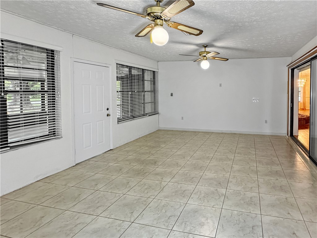 6602 Eden Road Fort Pierce, FL 34951 - Photo 10 of 24 a view of an empty room with a window