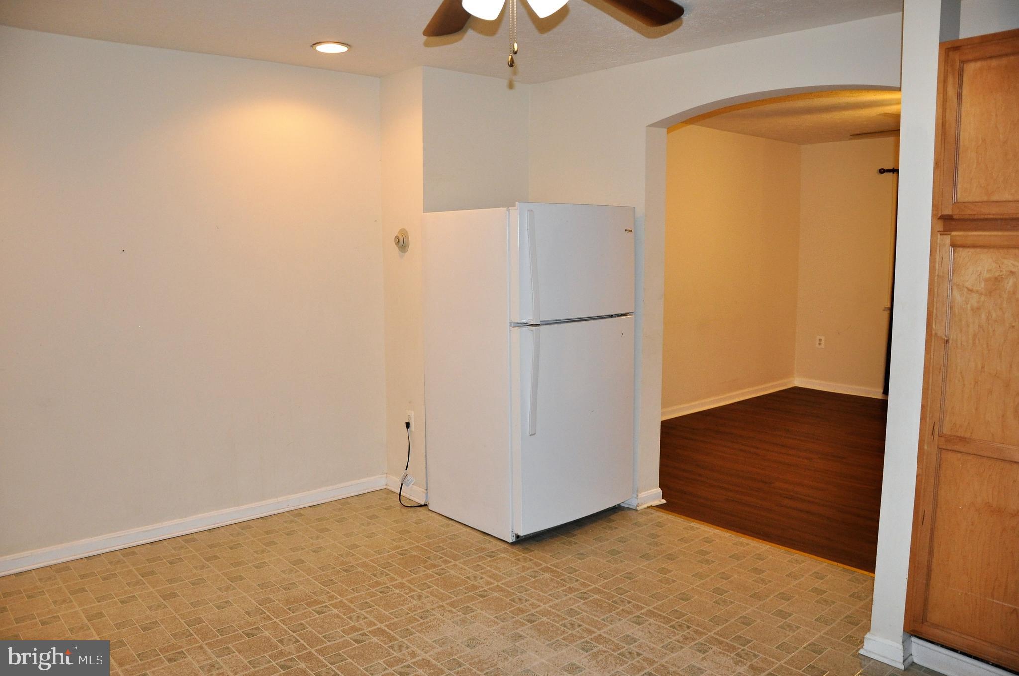 1939 Ormand Road Baltimore, MD 21222 - Photo 8 of 26 a view of a room with wooden floor