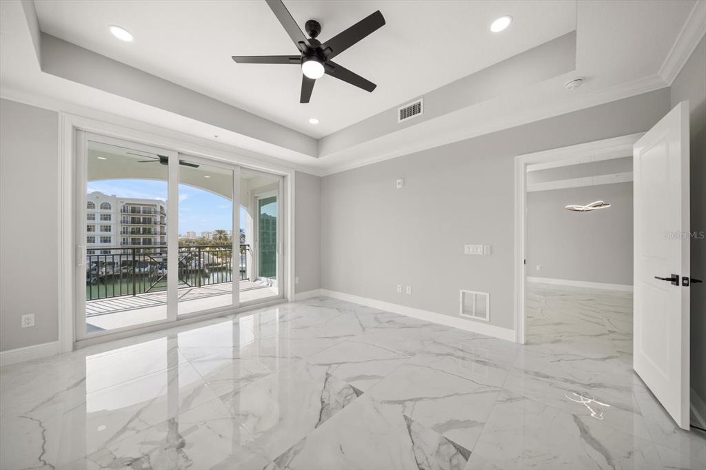 211 Dolphin Point, Unit 301 Clearwater, FL 33767 - Photo 16 of 48 a view of an empty room with a window