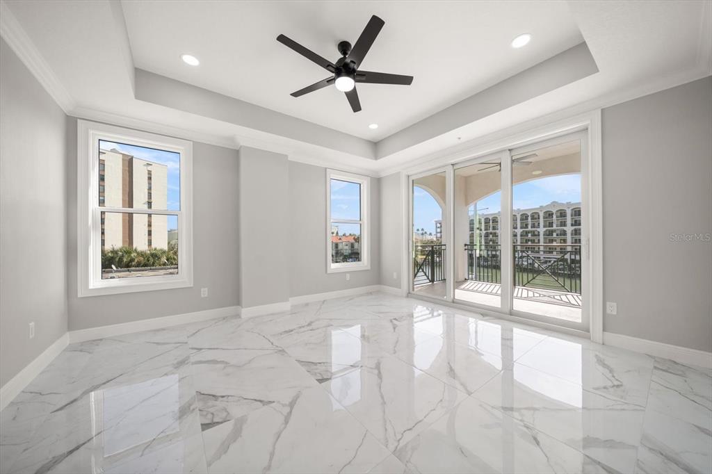 211 Dolphin Point, Unit 301 Clearwater, FL 33767 - Photo 8 of 48 a view of an empty room with a window