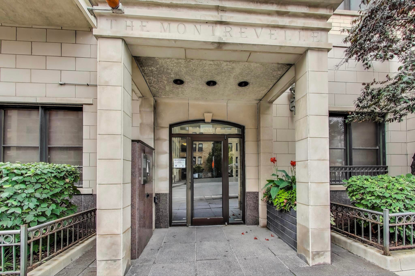 520 North Halsted Street, Unit 410 Chicago, IL 60642 - Photo 1 of 31 a front view of a house with plants