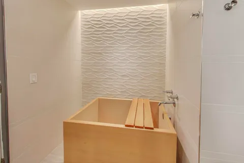 a bathroom with a bathtub