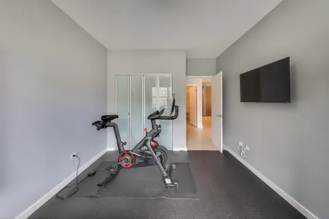 a view of a room with gym equipment