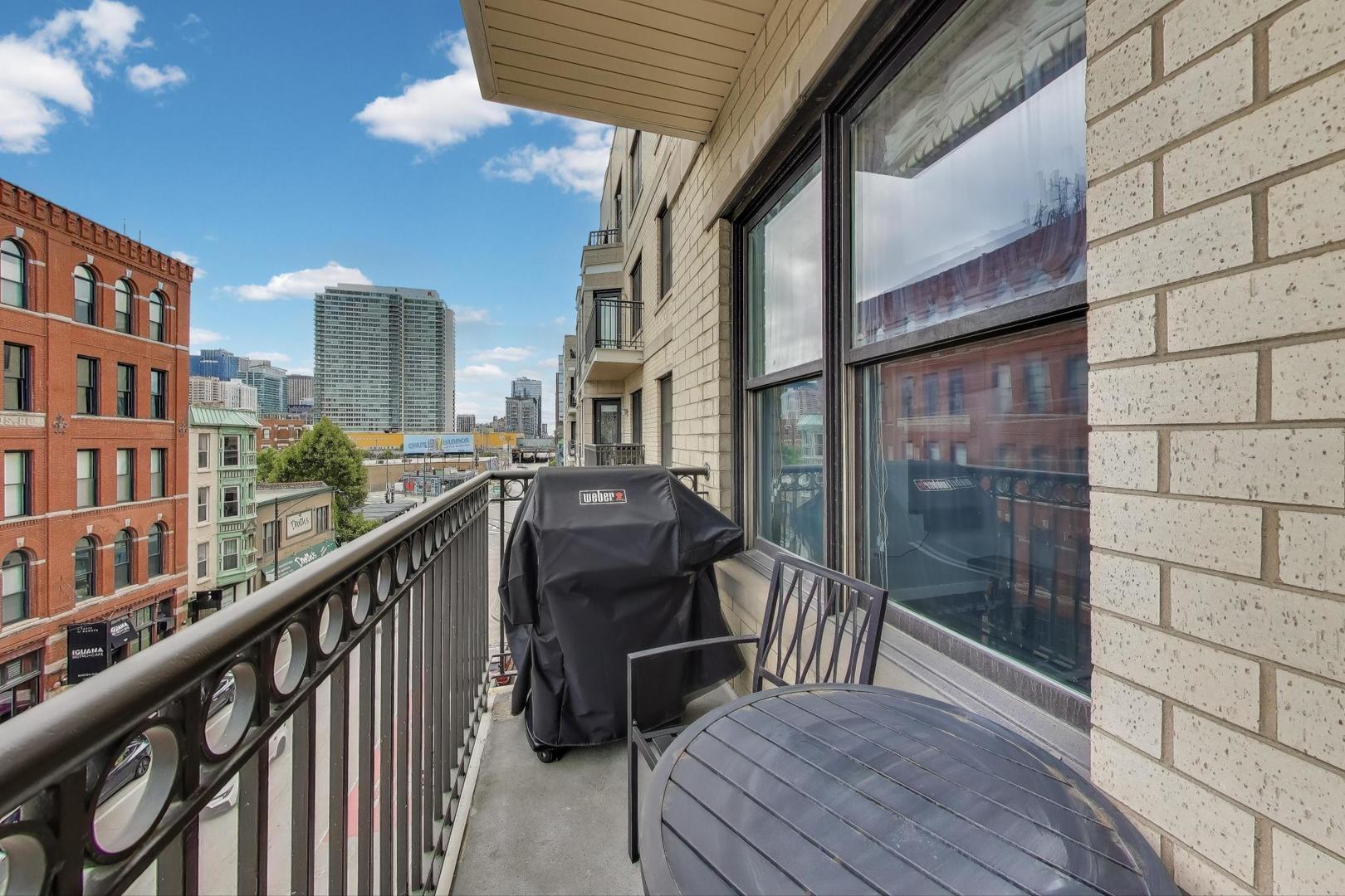 520 North Halsted Street, Unit 410 Chicago, IL 60642 - Photo 21 of 31 a view of balcony with furniture