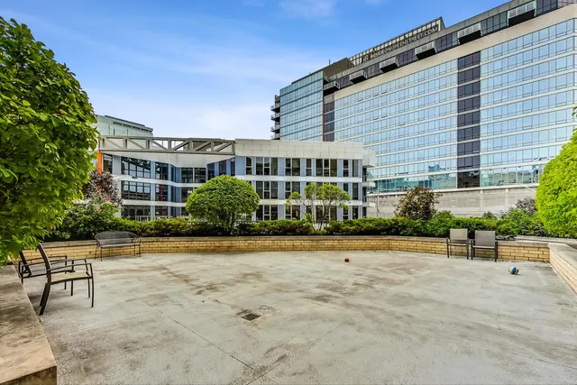 a picture of a bathroom with a shower