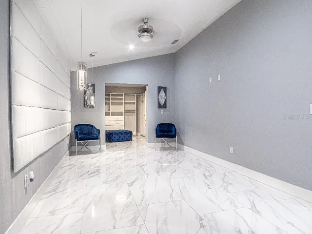 a view of a livingroom with a staircase
