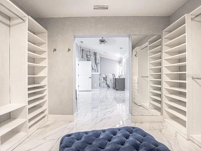 a view of bathroom with bathtub and shower