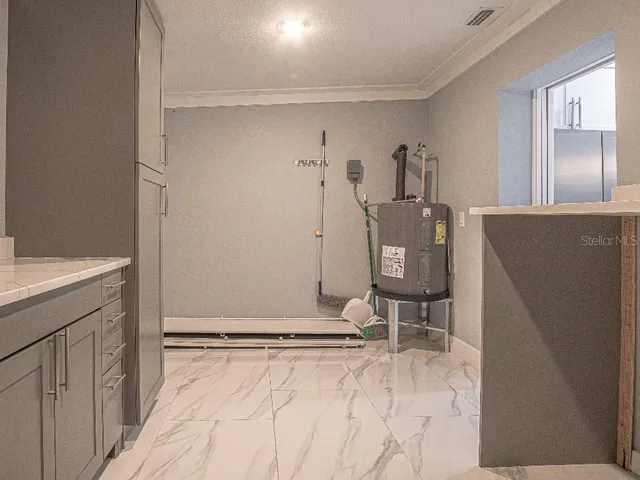 a view of a kitchen with a sink