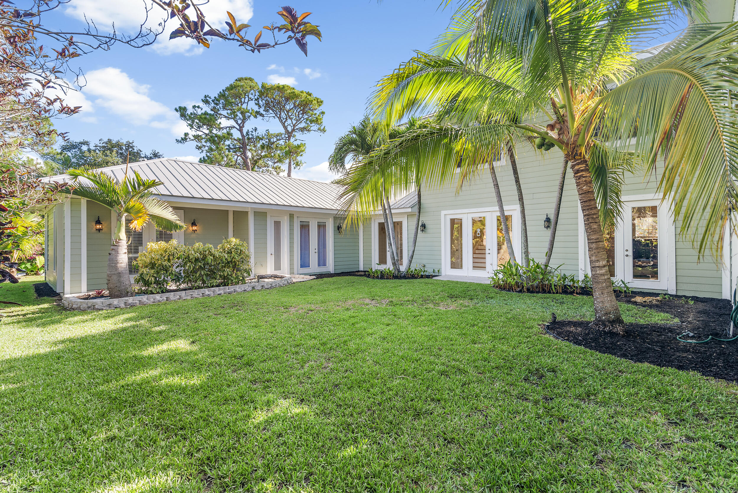 19067 Southeast County Line Road Jupiter, FL 33469 - Photo 66 of 93 Back Courtyard