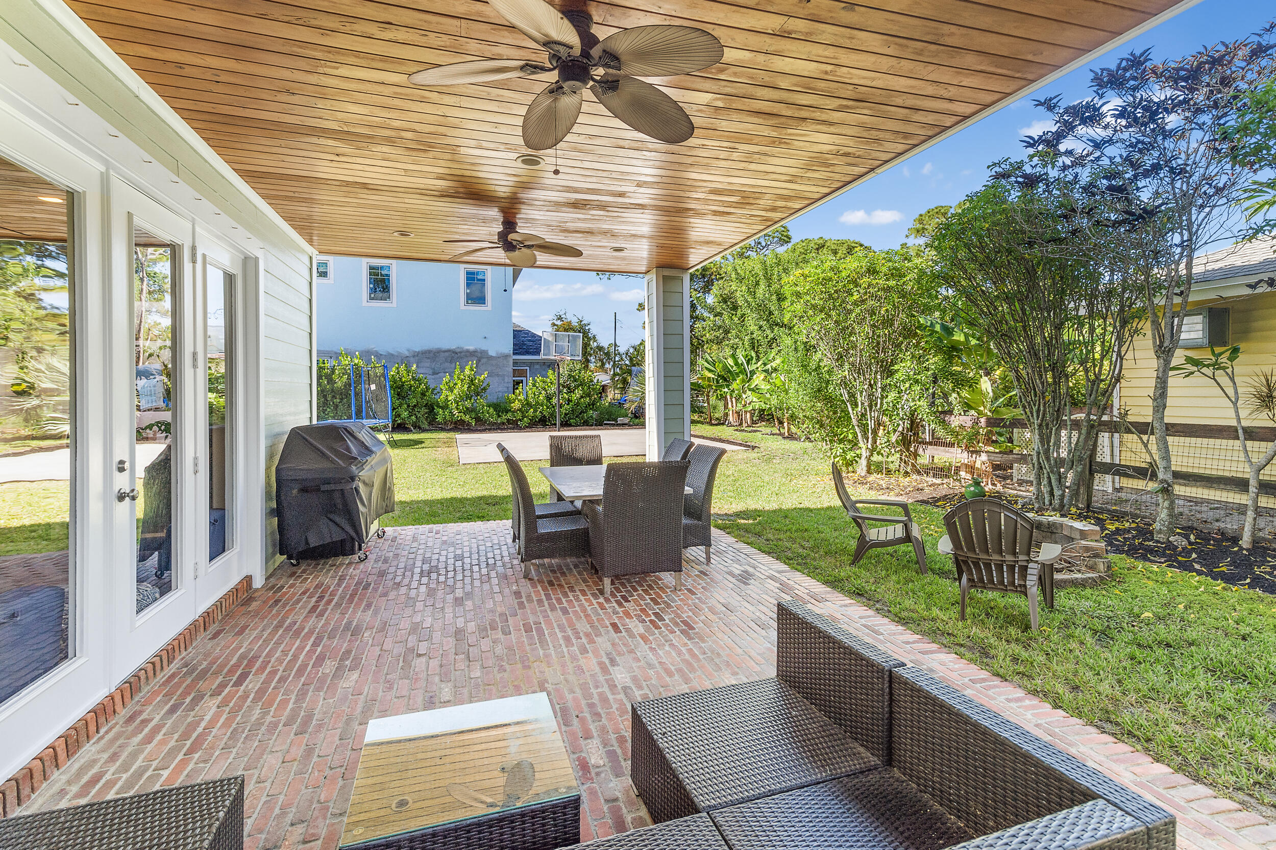 19067 Southeast County Line Road Jupiter, FL 33469 - Photo 68 of 93 Back Patio to main House