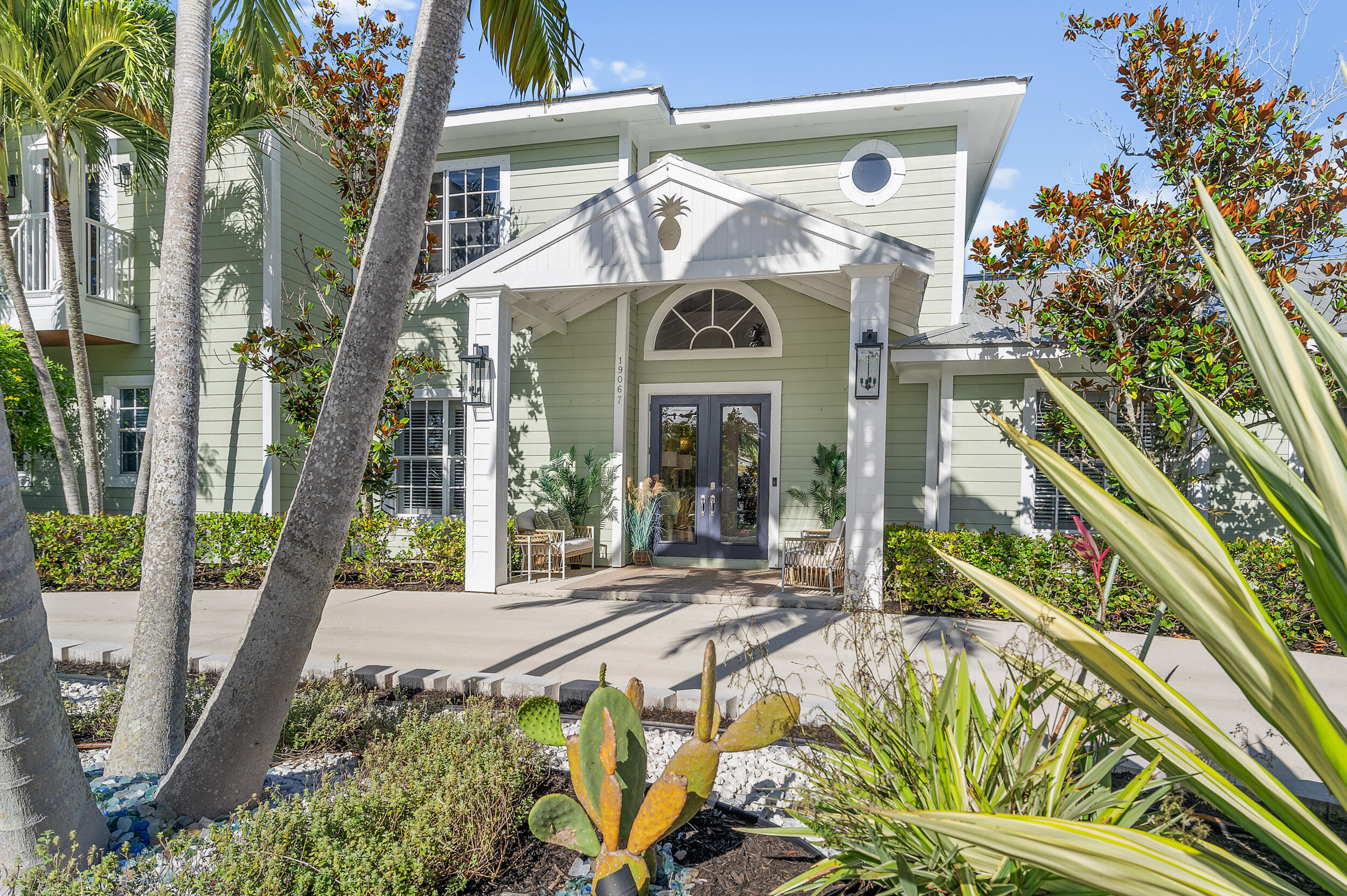 19067 Southeast County Line Road Jupiter, FL 33469 - Photo 8 of 93 Lush Tropical Landscaping