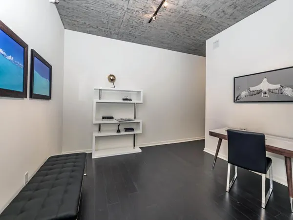 a view of workspace with wooden floor