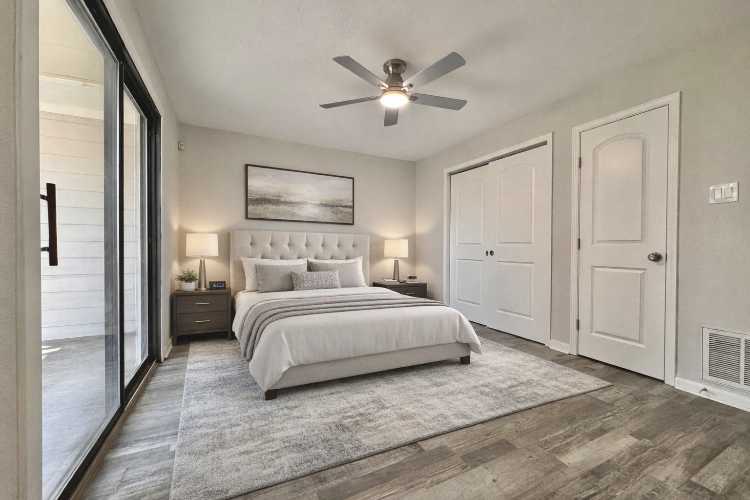 5115 Hialeah Drive Houston, TX 77092 - Photo 12 of 21 a bedroom with a large bed and a chandelier