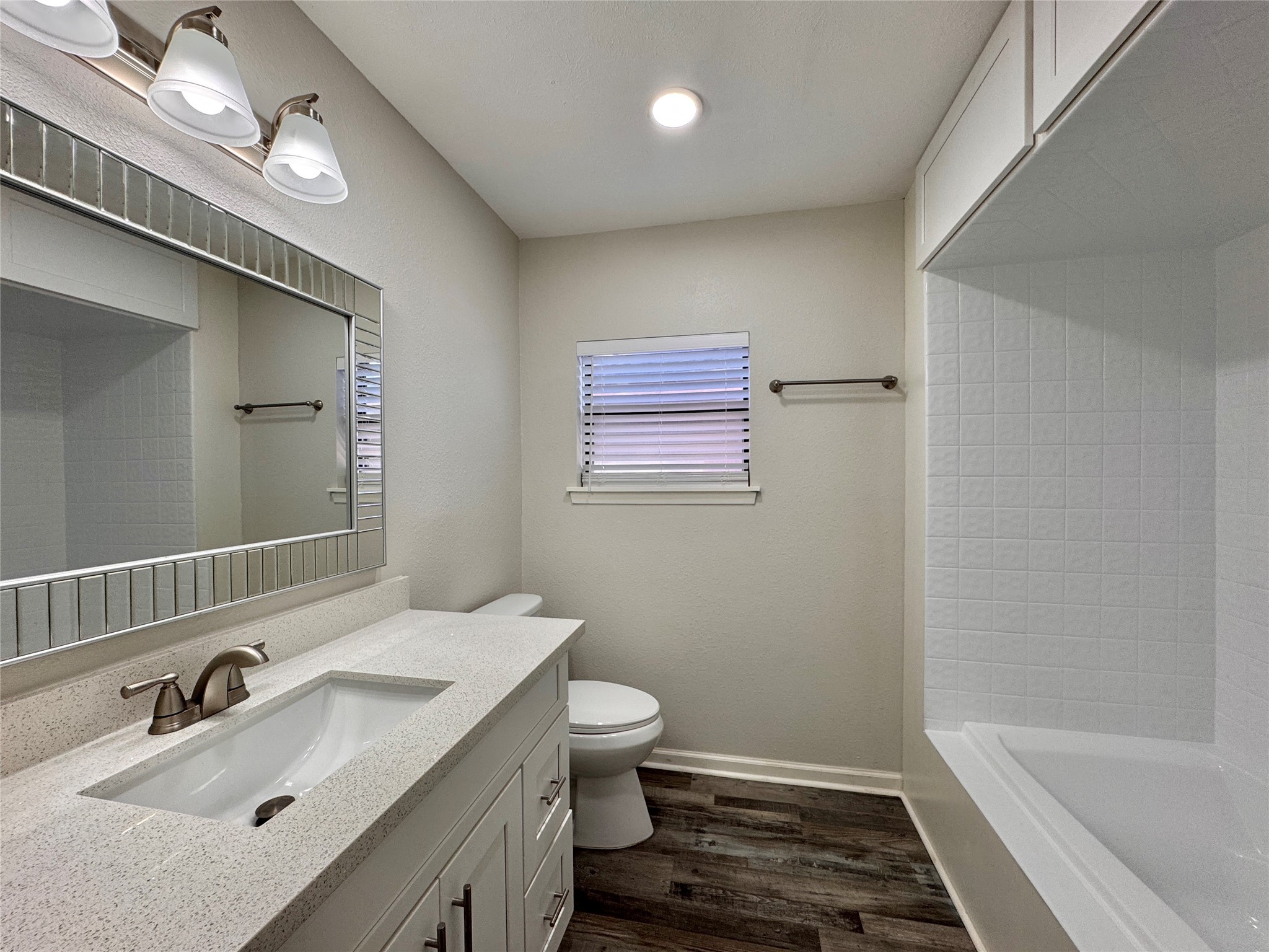 5115 Hialeah Drive Houston, TX 77092 - Photo 17 of 21 a bathroom with a sink a toilet and shower