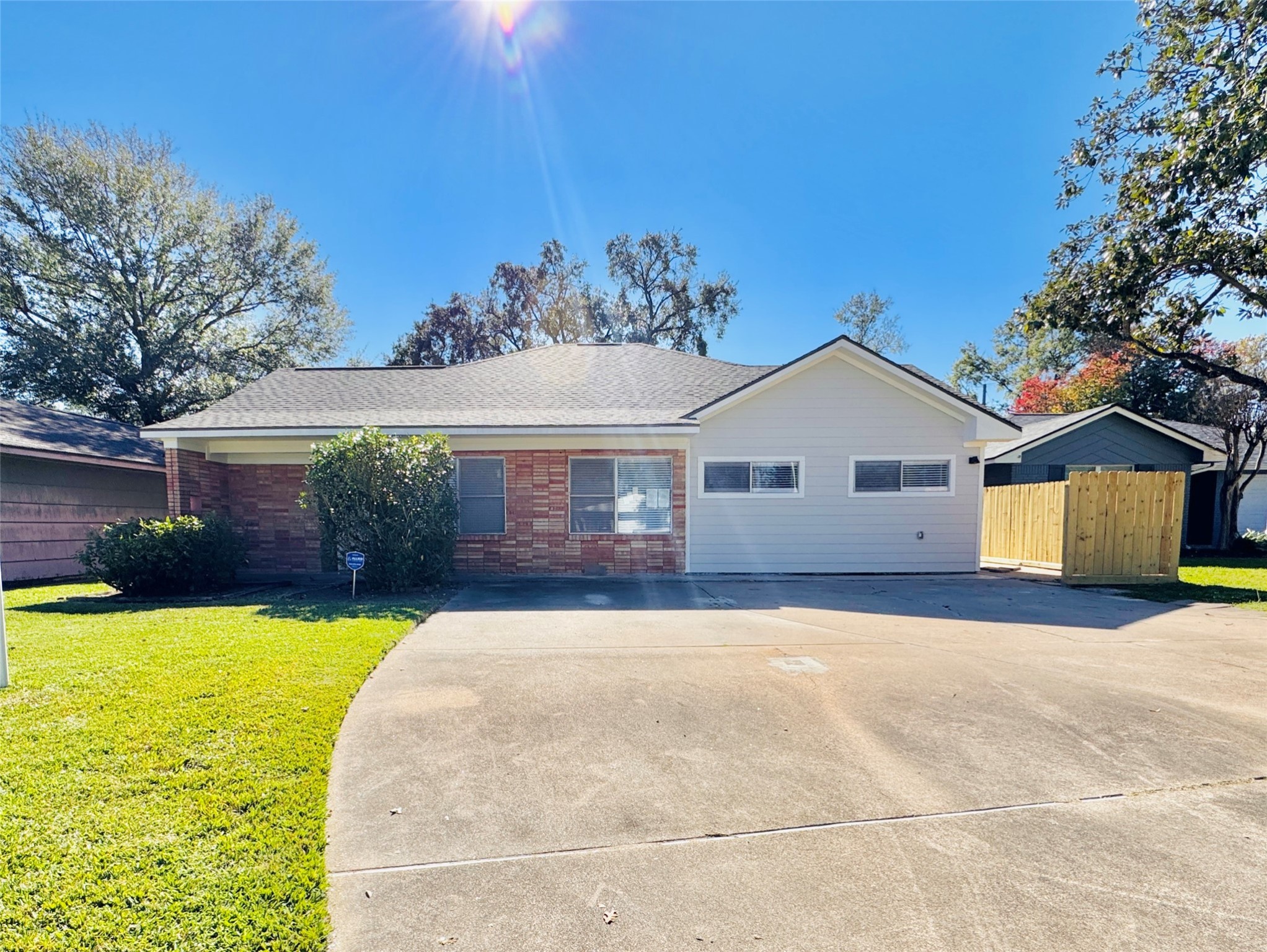 5115 Hialeah Drive Houston, TX 77092 - Photo 21 of 21 a front view of a house with yard and garage