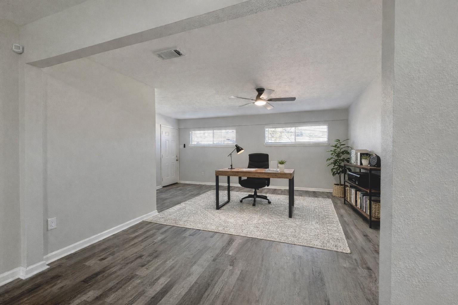 5115 Hialeah Drive Houston, TX 77092 - Photo 9 of 21 a view of a workspace with furniture window and wooden floor