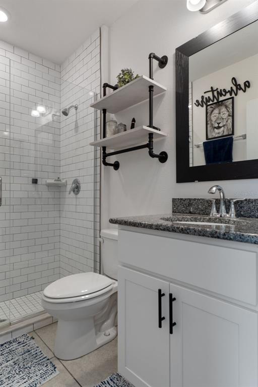 3313 Dorian Avenue Spring Hill, FL 34606 - Photo 39 of 57 a bathroom with a sink a toilet and shower