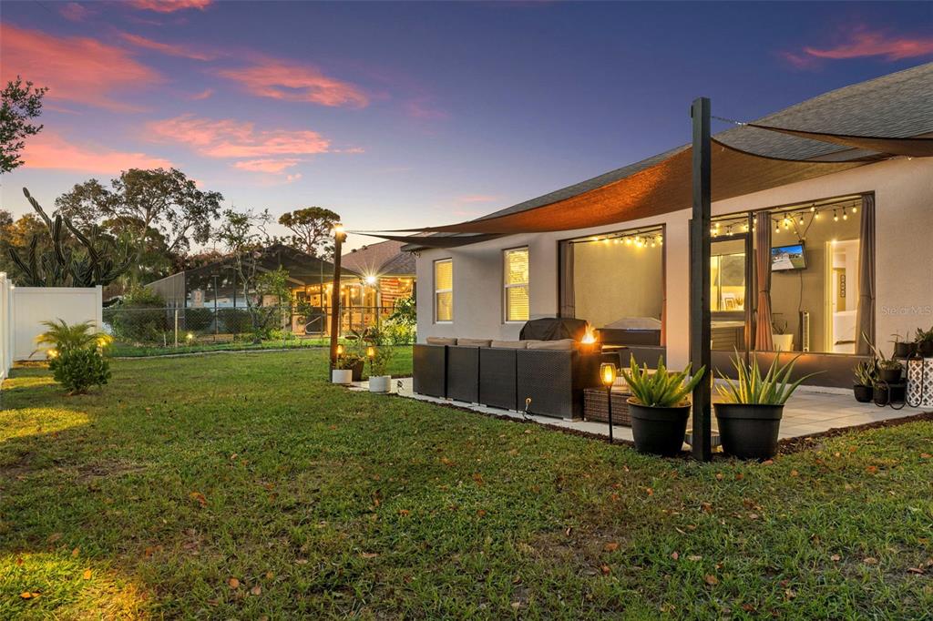 3313 Dorian Avenue Spring Hill, FL 34606 - Photo 47 of 57 a view of a house with backyard