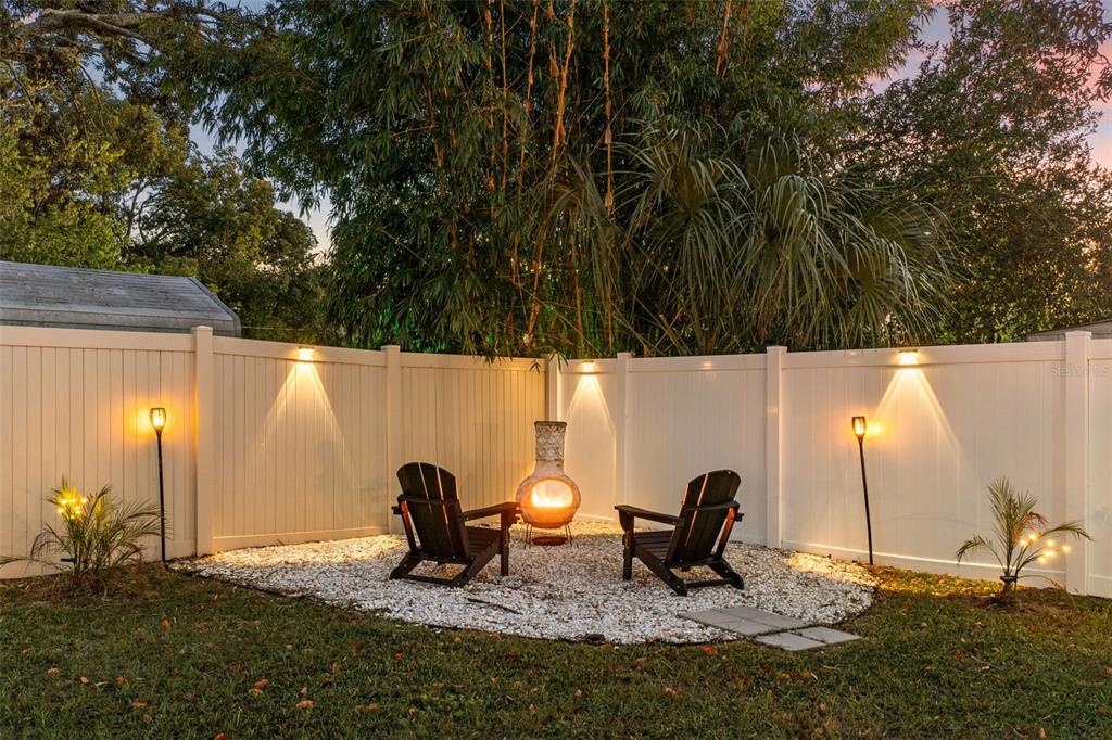 3313 Dorian Avenue Spring Hill, FL 34606 - Photo 48 of 57 a backyard of a house with seating space