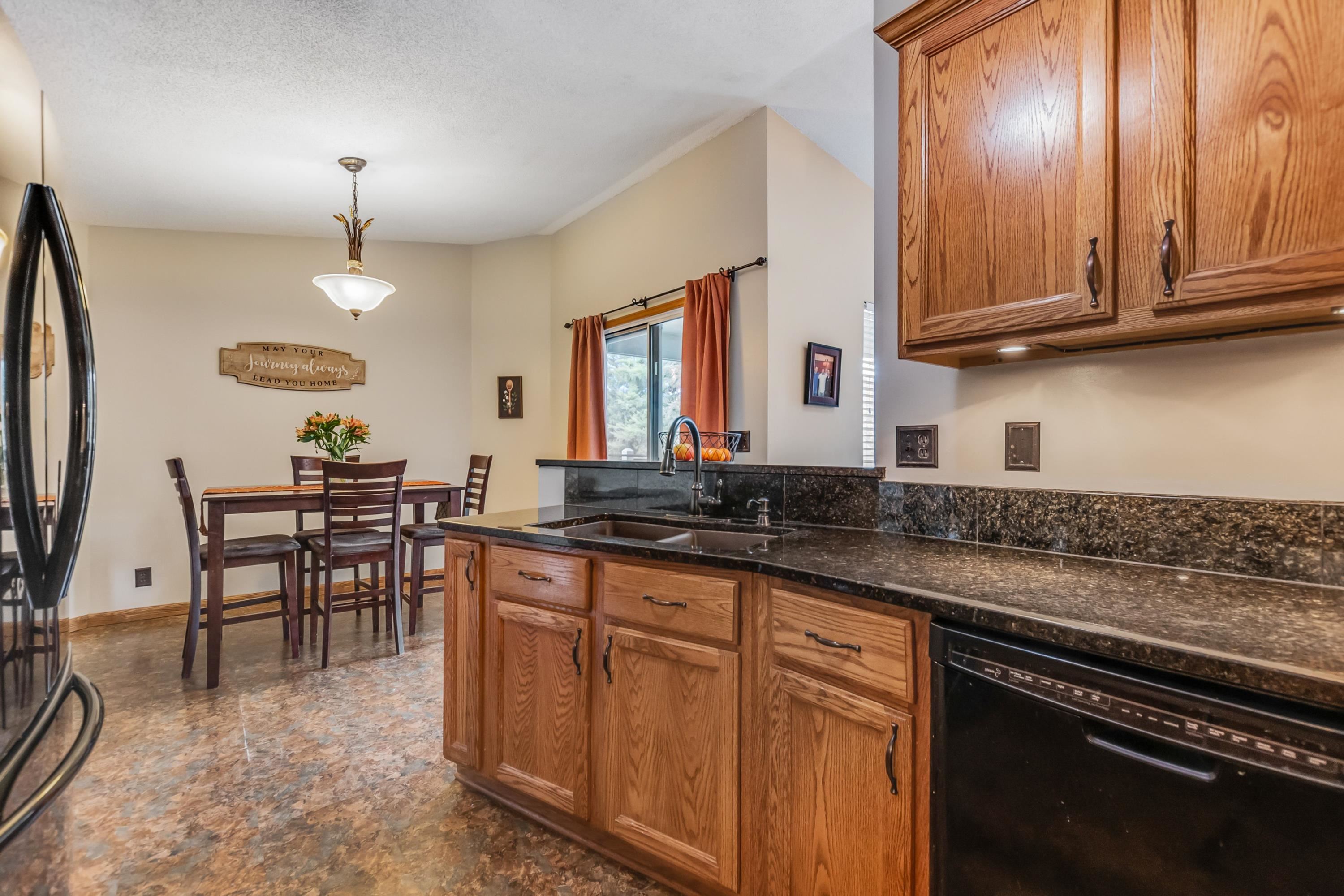 2244 South Prescott Street Wichita, KS 67209 - Photo 9 of 27 View of Dining Room from Kitchen