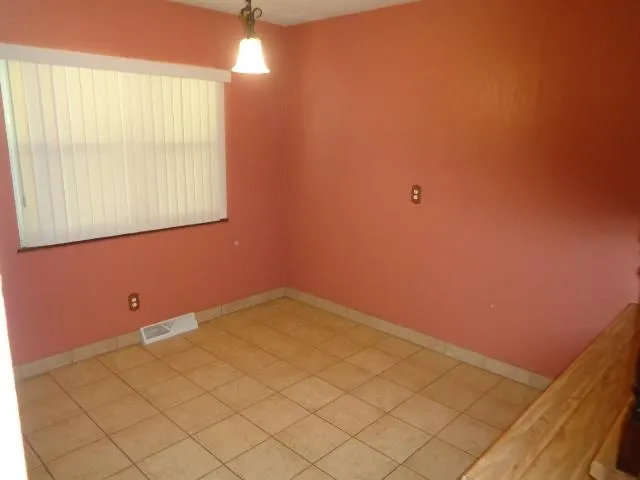 a view of a room with a window