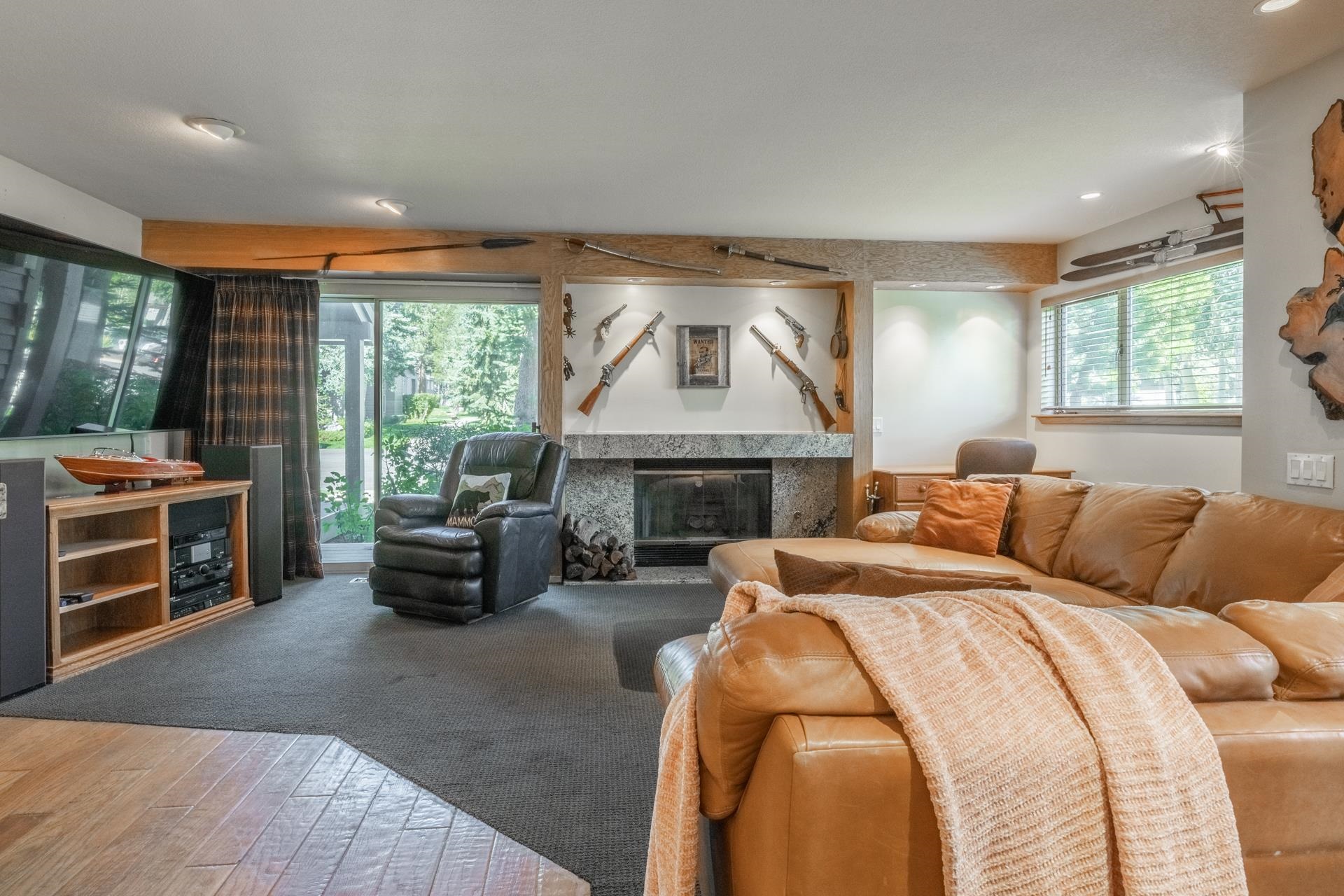 623 Golden Creek Road, Unit 623 Mammoth Lakes, CA 93546 - Photo 2 of 33 a bed room with bed and a fireplace