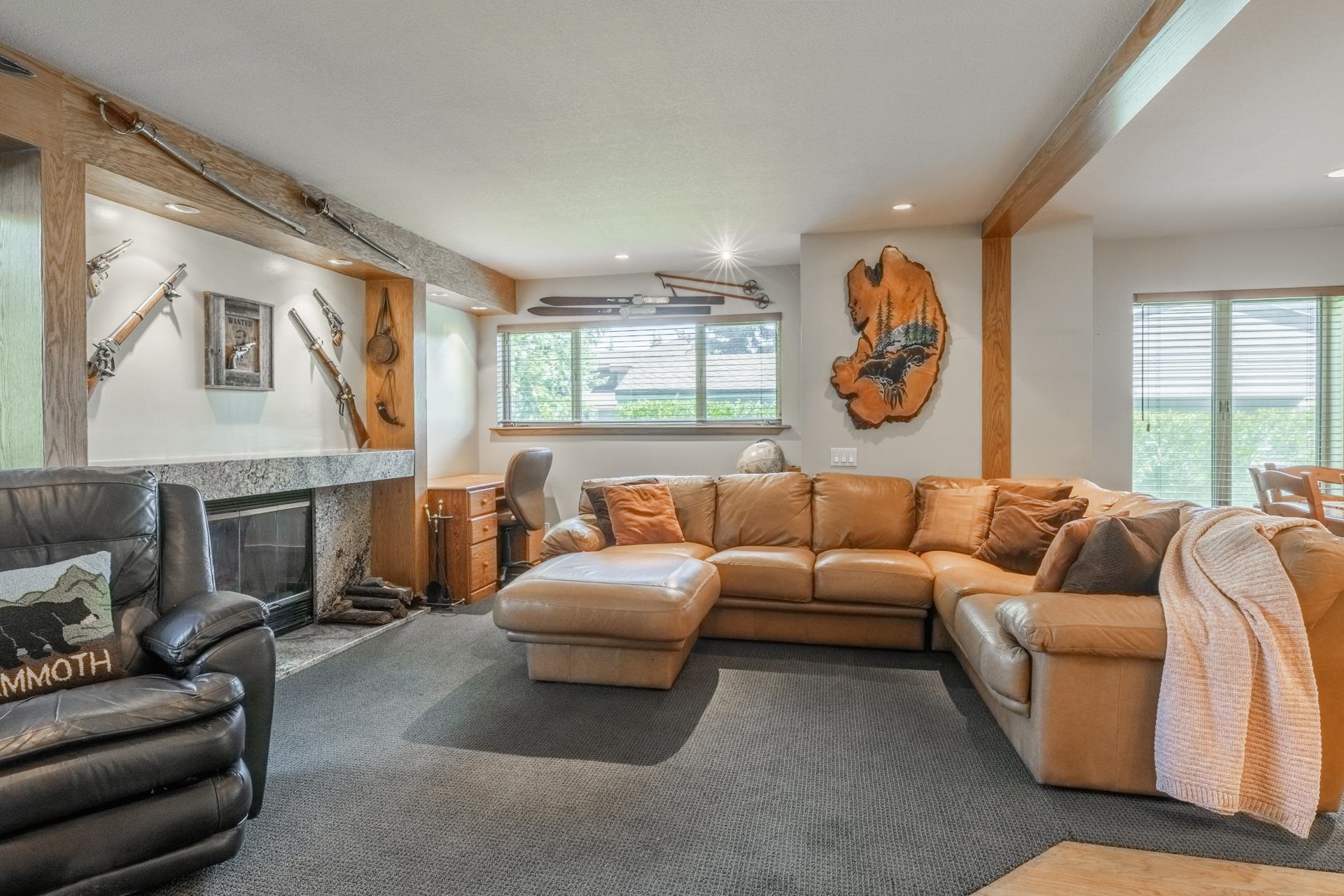 623 Golden Creek Road, Unit 623 Mammoth Lakes, CA 93546 - Photo 6 of 33 a living room with furniture and a fireplace
