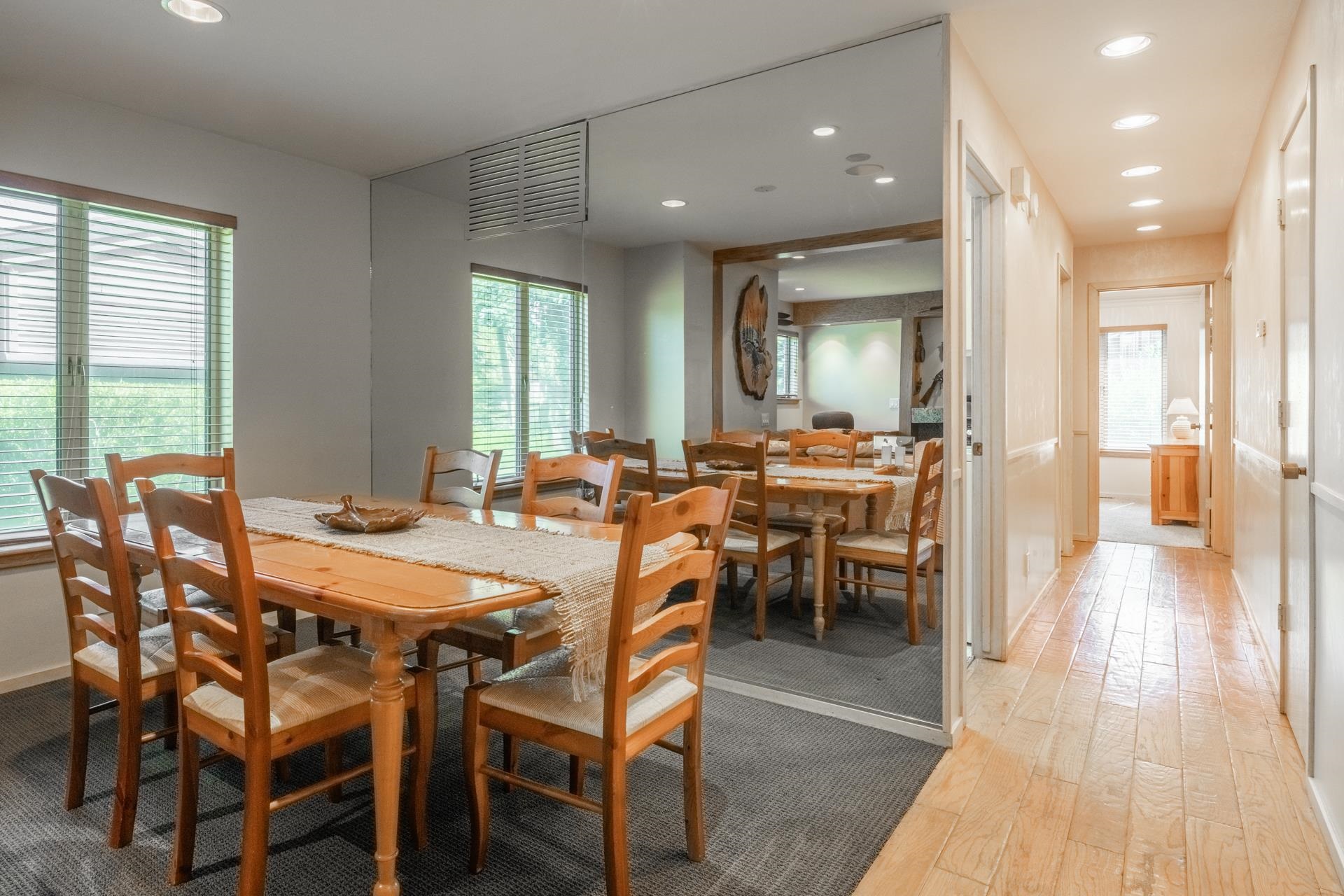 623 Golden Creek Road, Unit 623 Mammoth Lakes, CA 93546 - Photo 9 of 33 a view of a dining room with furniture and wooden floor
