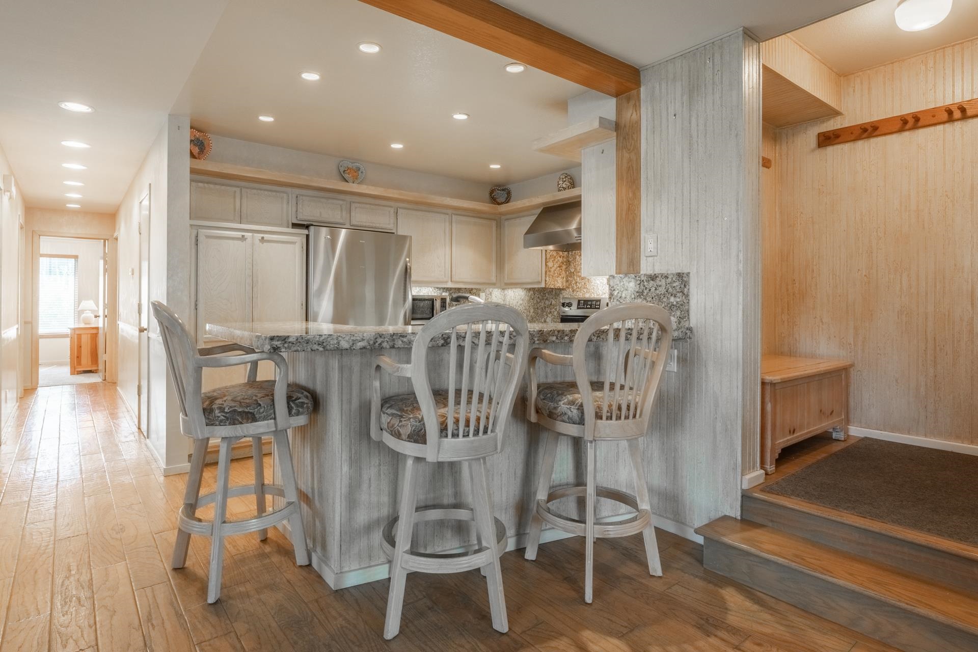 623 Golden Creek Road, Unit 623 Mammoth Lakes, CA 93546 - Photo 10 of 33 a dining room with furniture and wooden floor