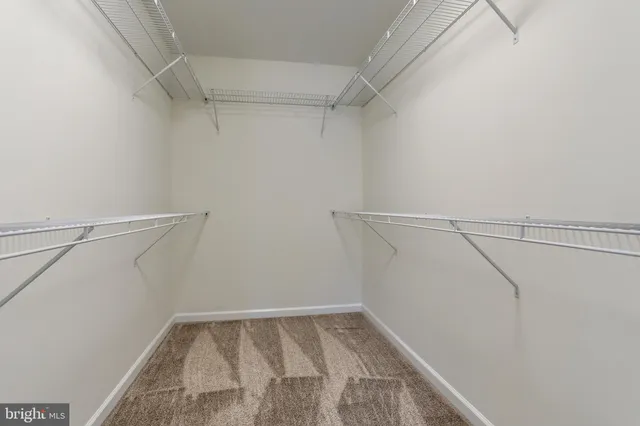 a view of a room with racks on the wall