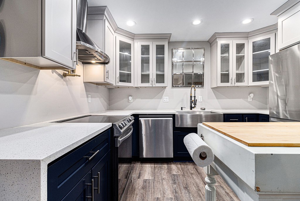 220 Fox Den Circle Jasper, GA 30143 - Photo 11 of 29 a kitchen with a sink stove and cabinets