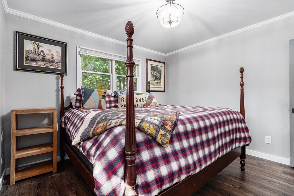 220 Fox Den Circle Jasper, GA 30143 - Photo 15 of 29 a bedroom with a bed and a window