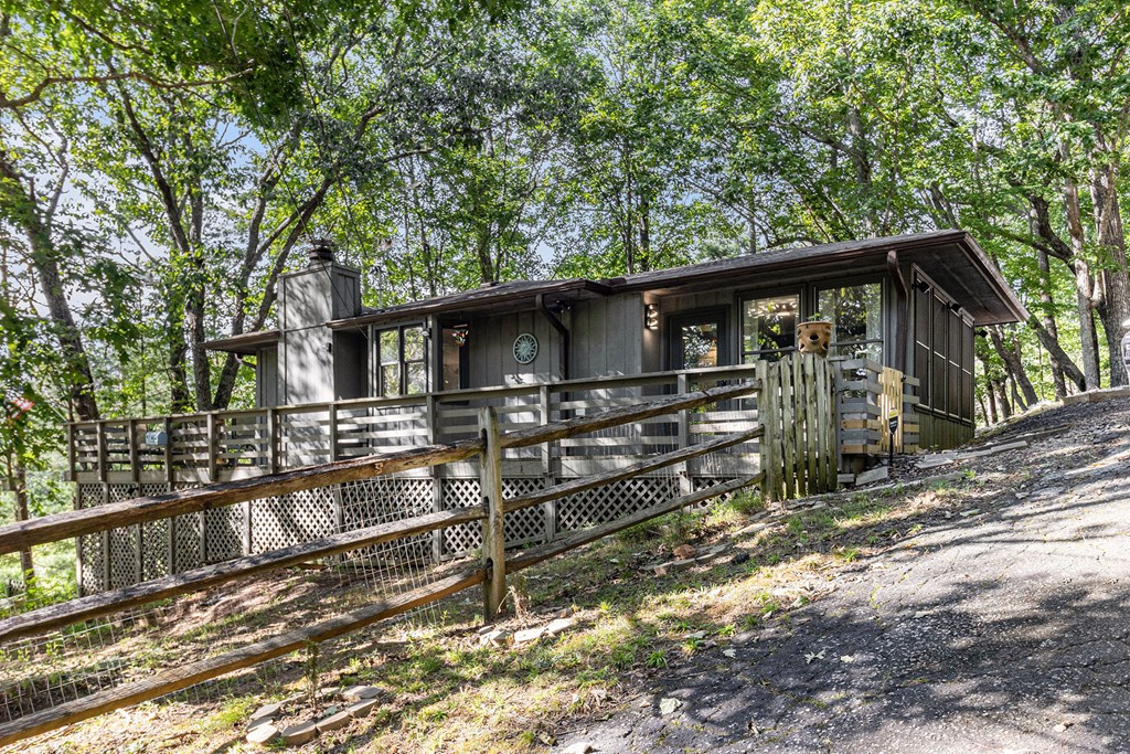 220 Fox Den Circle Jasper, GA 30143 - Photo 2 of 29 front view of a house with a large tree